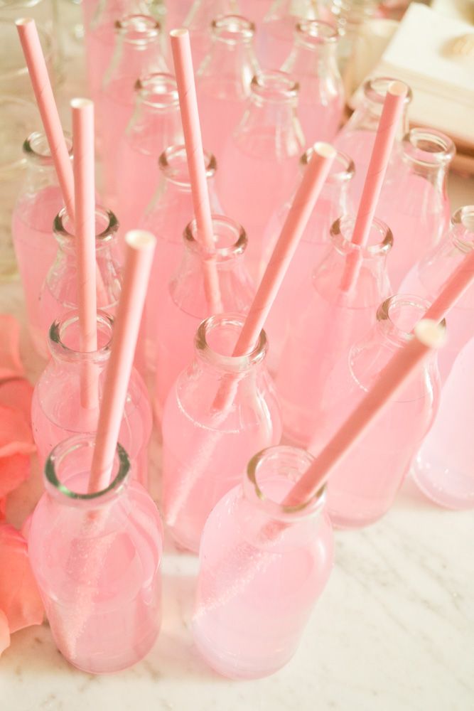 Pink lemonade in mini milk glass bottles