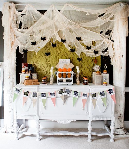 White cheesecloth drape for Halloween party